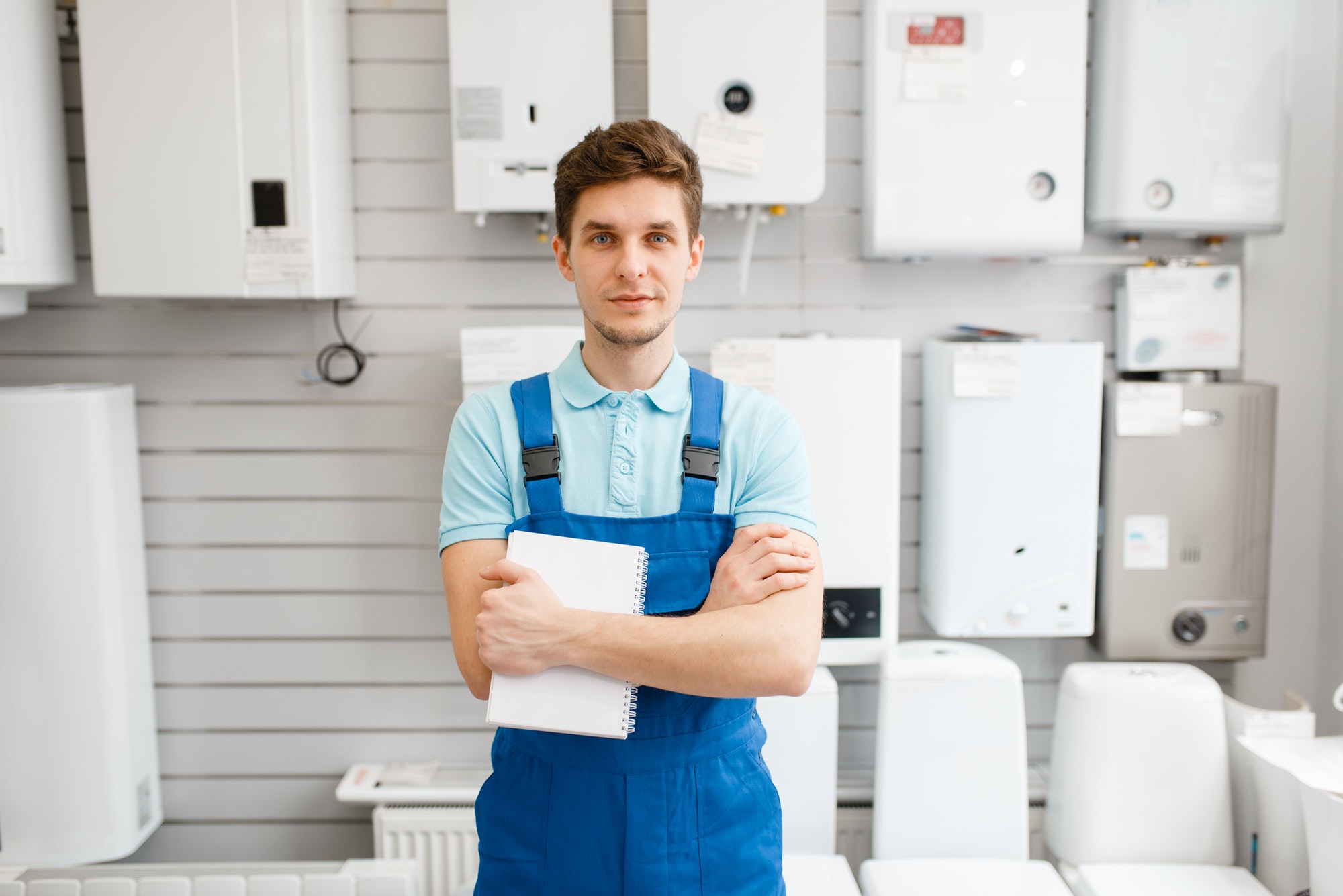 plumber-at-showcase-with-boilers-plumbering-store.jpg